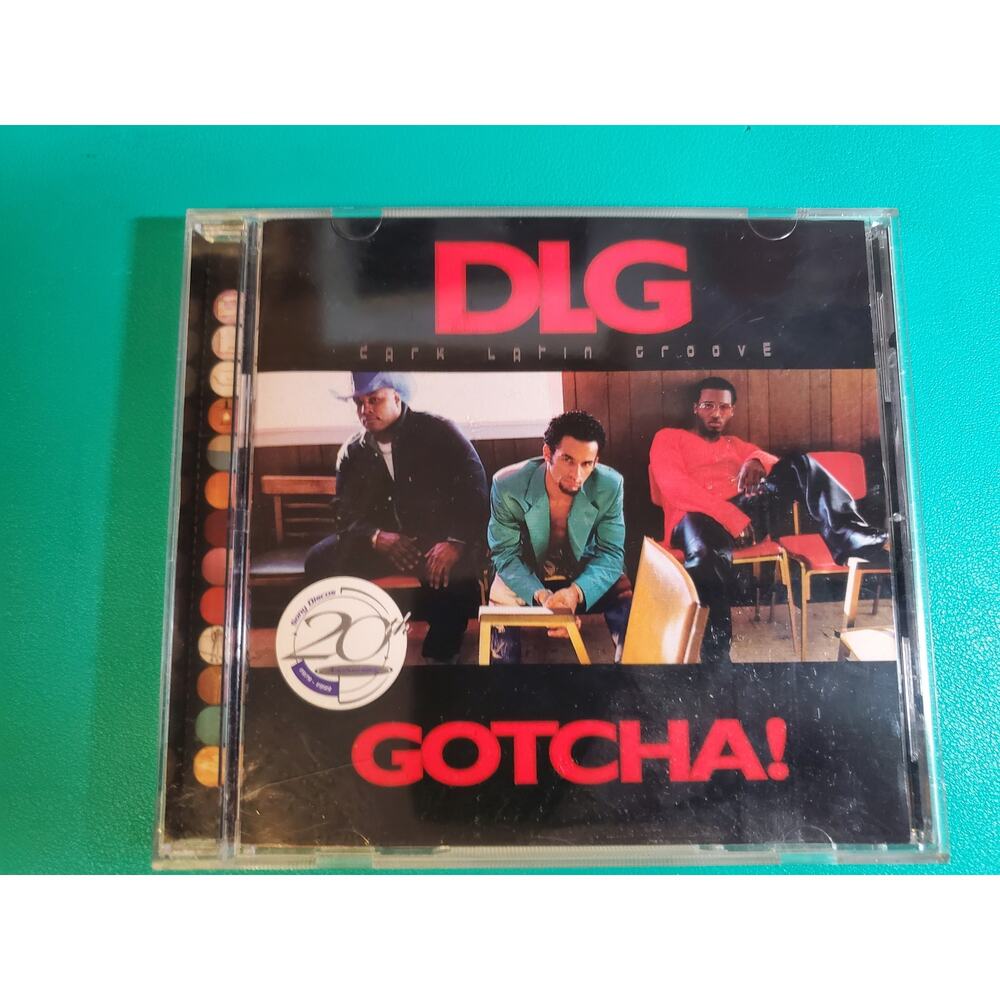 DLG - Gotcha! - Latin Music (US Version, CD)